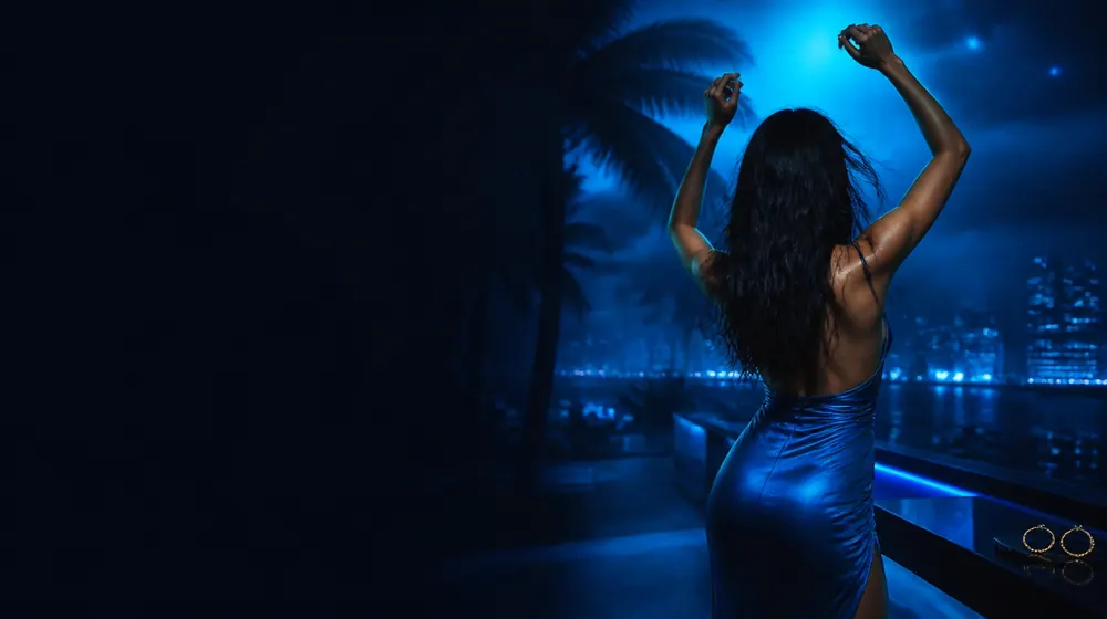 Latina MILF OnlyFans creators — woman dancing under palm silhouettes and city lights, gold hoop earrings on the vanity tray