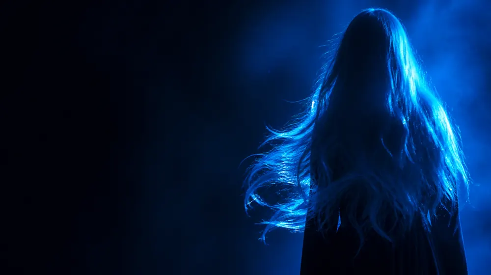 Long Hair OnlyFans creators — long flowing hair catching bright blue rim light, waist-length hair fanned in the rim light